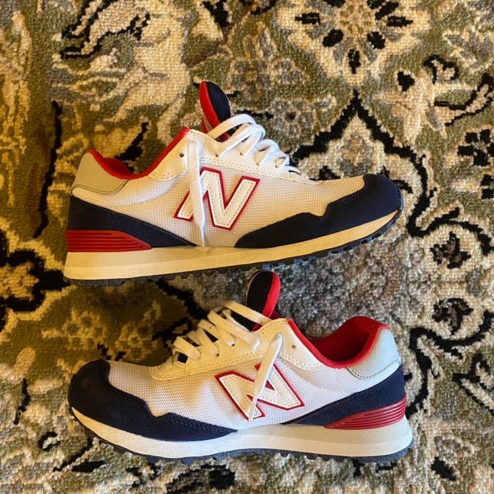 New balance

Size 7.5 mens fits size 9 women 
Like new